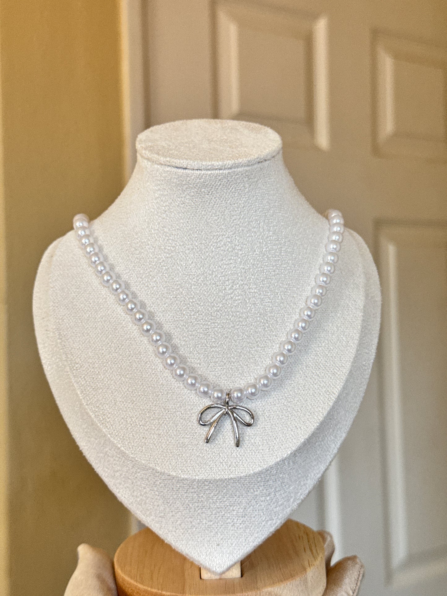 Silver Bow Pearl Necklace